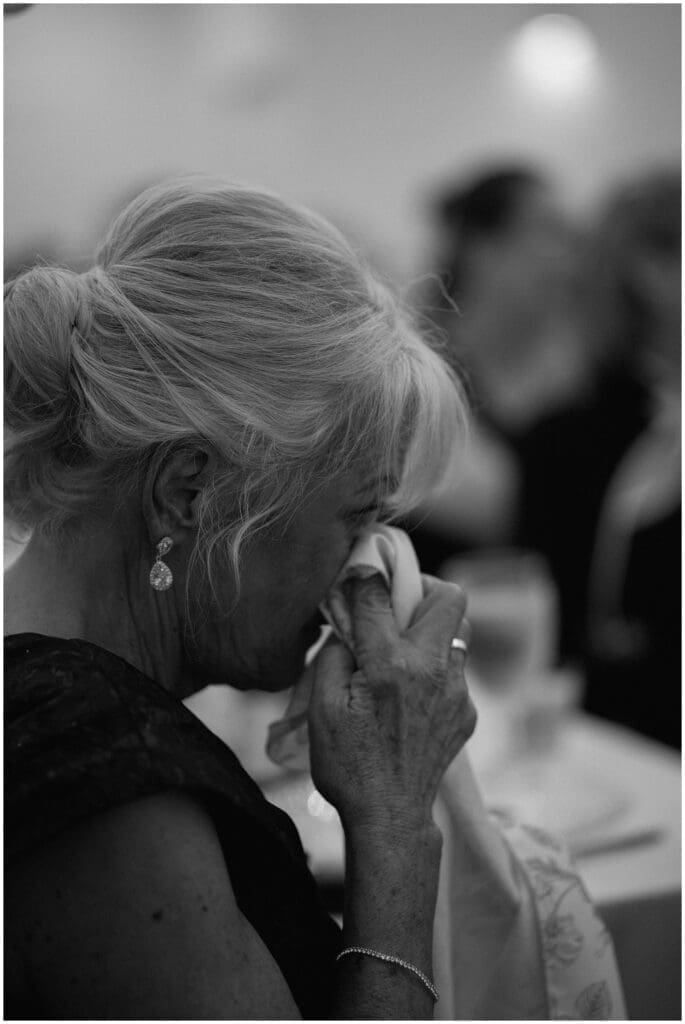 Mother of the bride crying during toasts at Addison Woods