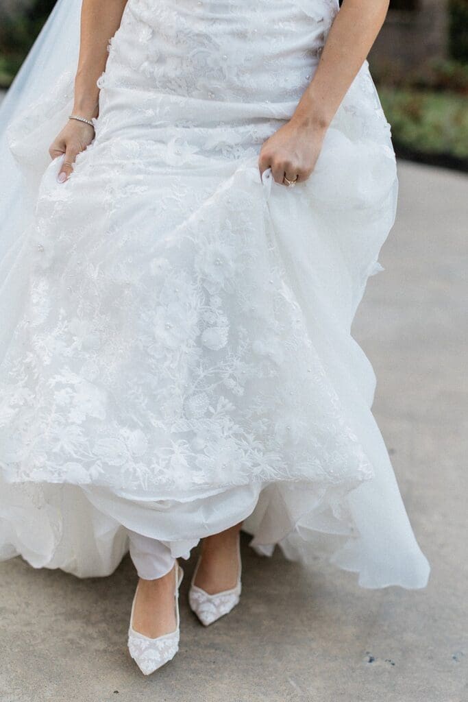 Close up of brides shoes while she runs at Iron Manor